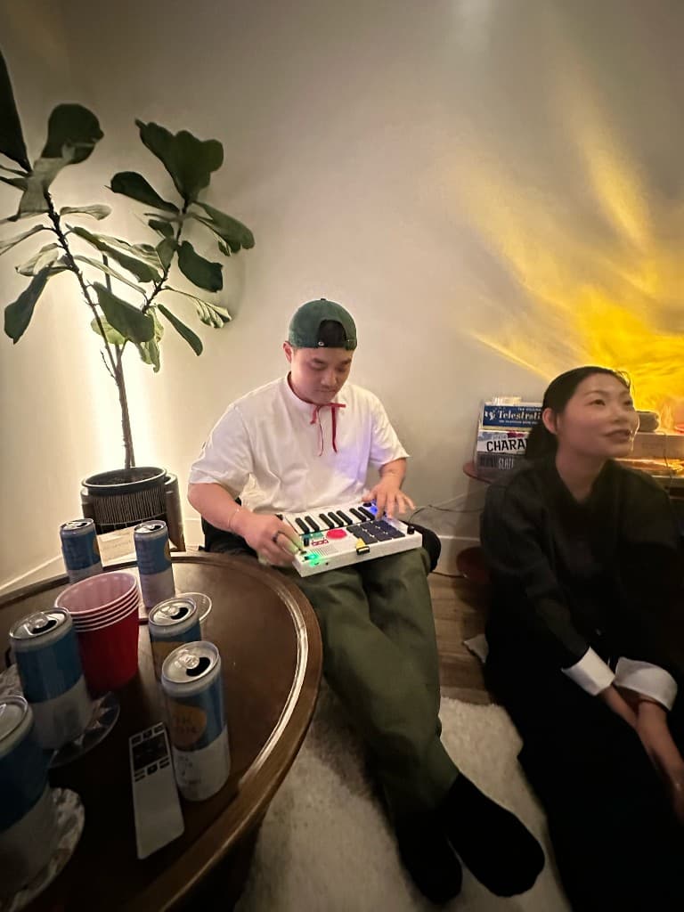 Playing The Beat Brick at a house party while friends hang out